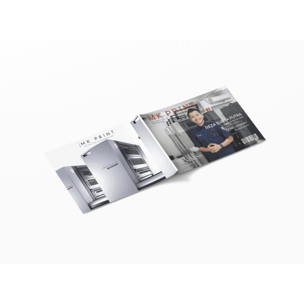 Dua majalah MK Print terbuka, menampilkan mesin cetak dan Reza Surya Putra